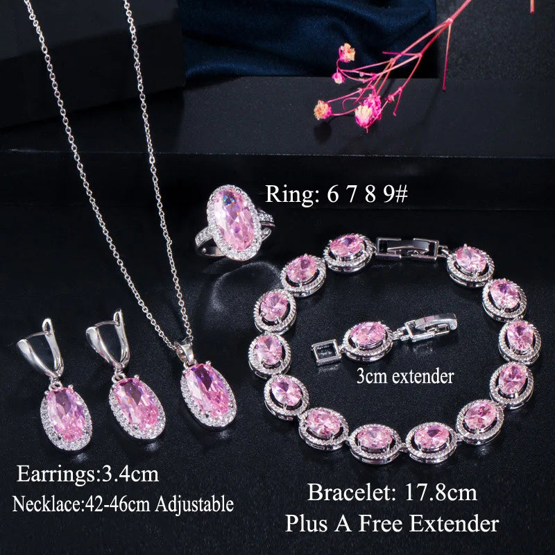 Oval pink CZ jewelry set: heart ring, oval earrings, chain necklace, and beaded bracelet