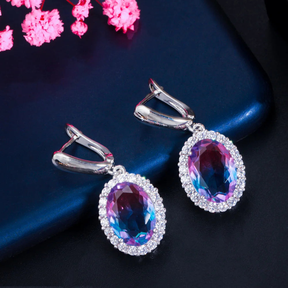 CZ oval gradient drop earrings with silver-toned halo settings