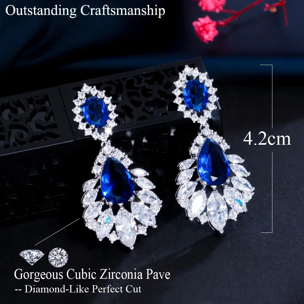 Blue cubic zirconia chandelier earrings shown with a 4.2 cm length