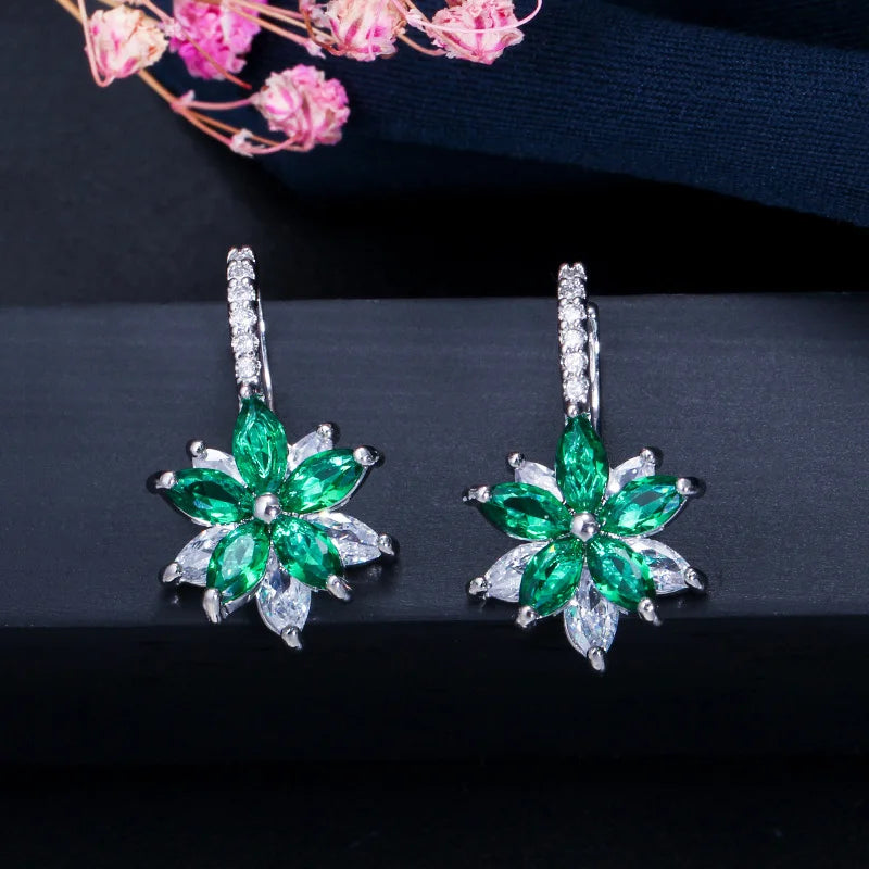 Pair of green flower earrings with clear outer petals and stone-set hoops