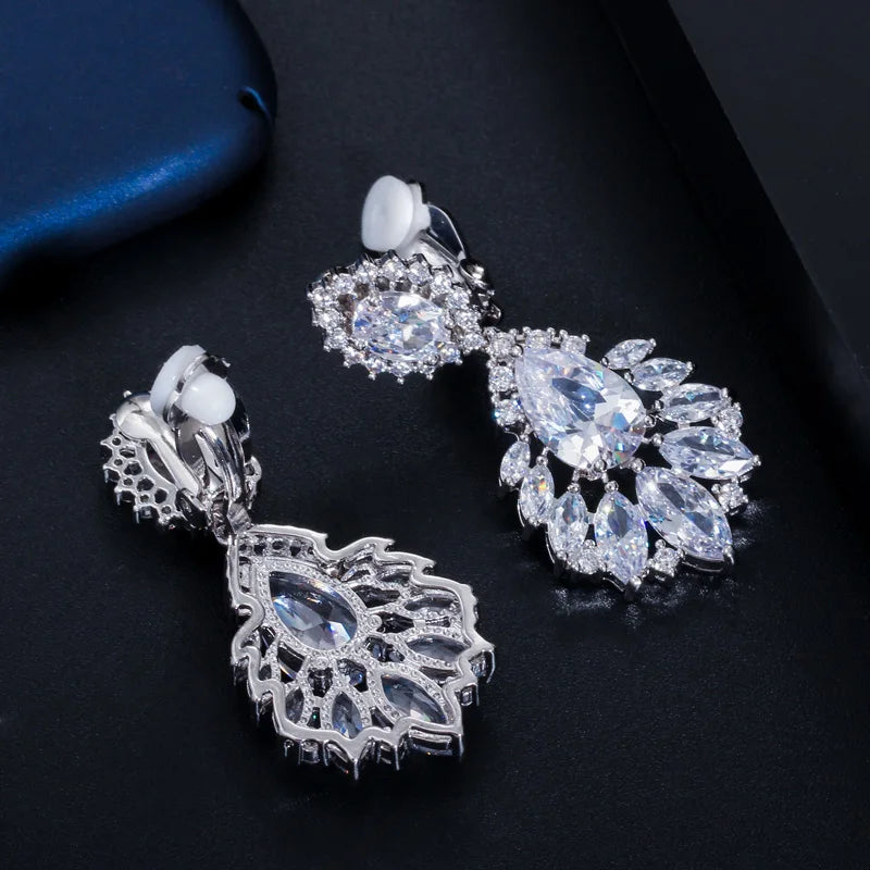 Silver-toned CZ drop earrings with marquise fringe and oval center stones