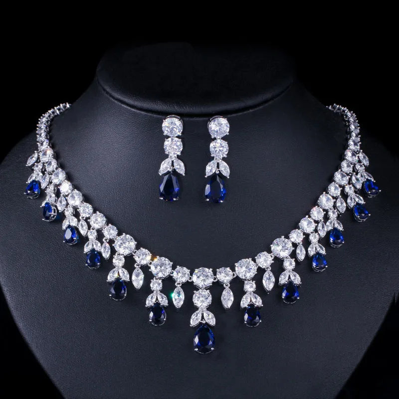 Rhinestone teardrop necklace and drop earrings set with blue teardrop stones