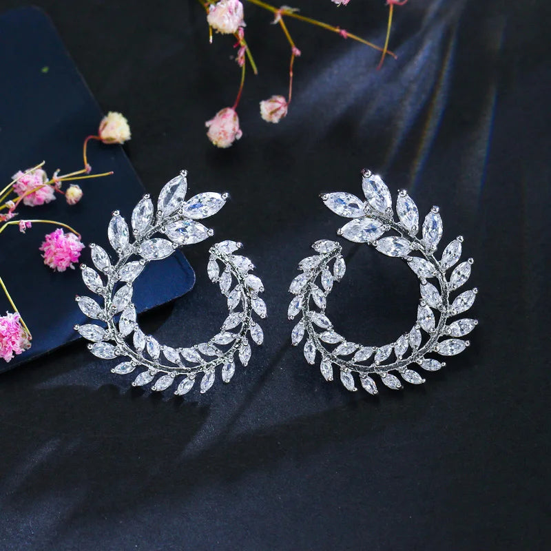 Silver-tone leaf CZ hoop earrings with circular wreath design
