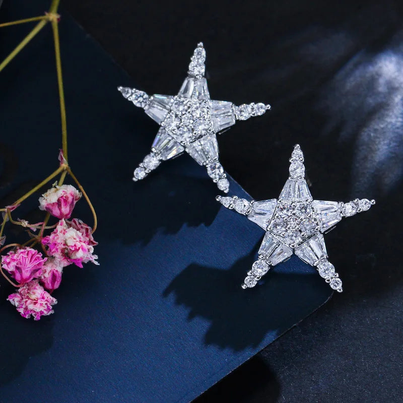 Pair of five-point star earrings with clear cubic zirconia stones