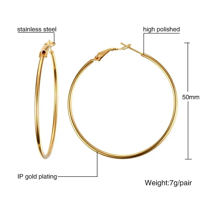 50 mm gold-tone stainless steel hoop earrings with a polished finish.