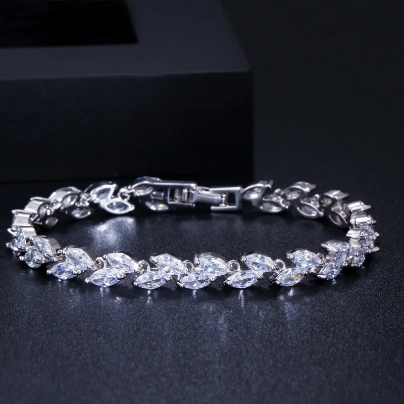 Silver-tone cubic zirconia tennis bracelet with oval stones and clasp