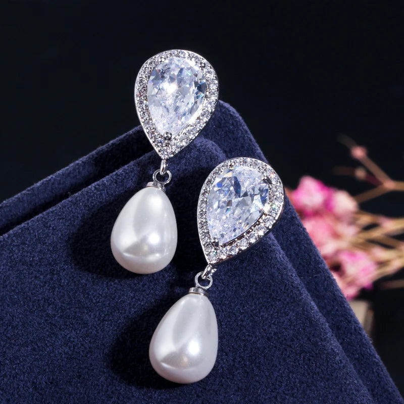 Dangling heart CZ earrings with white teardrop pearl drops and matching necklace chain