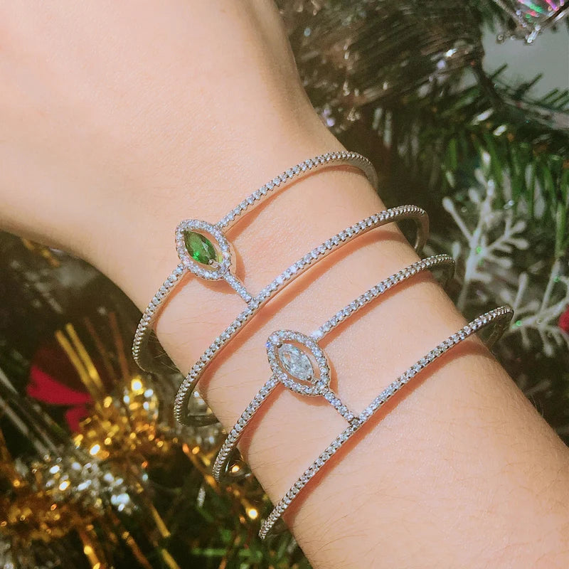 CZ open cuff bangle with green oval stone and matching open ring detail