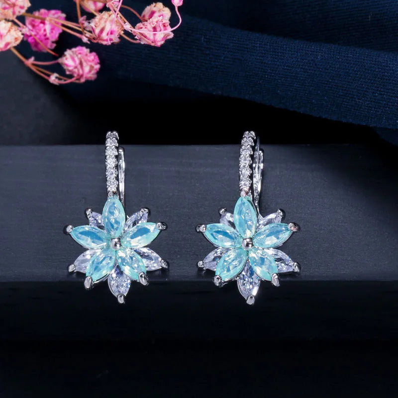 Geometric flower cubic zirconia stud earrings with aqua and clear stones
