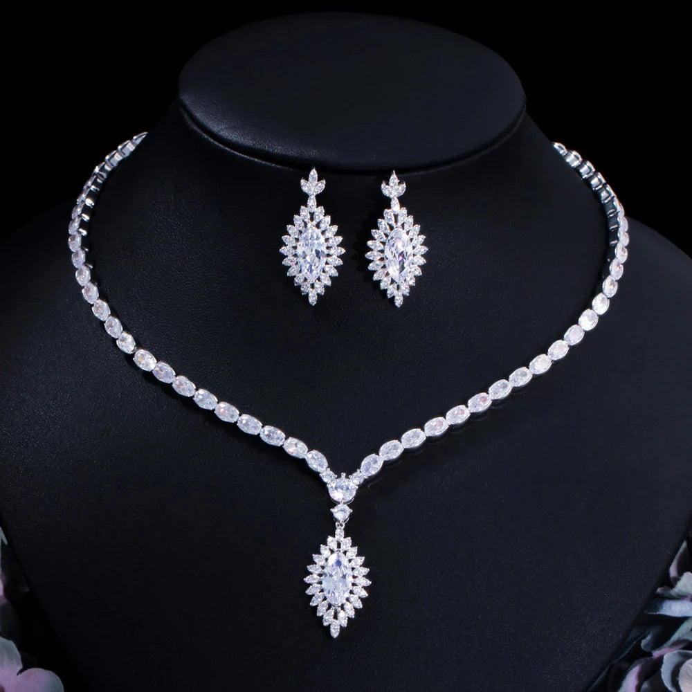 Silver tone cubic zirconia necklace with teardrop pendant and oval stud drop earrings