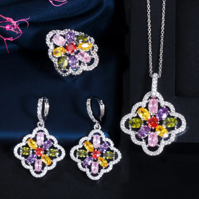 Three-piece silver-tone jewelry set with multicolor floral zircon pendant, earrings, and ring