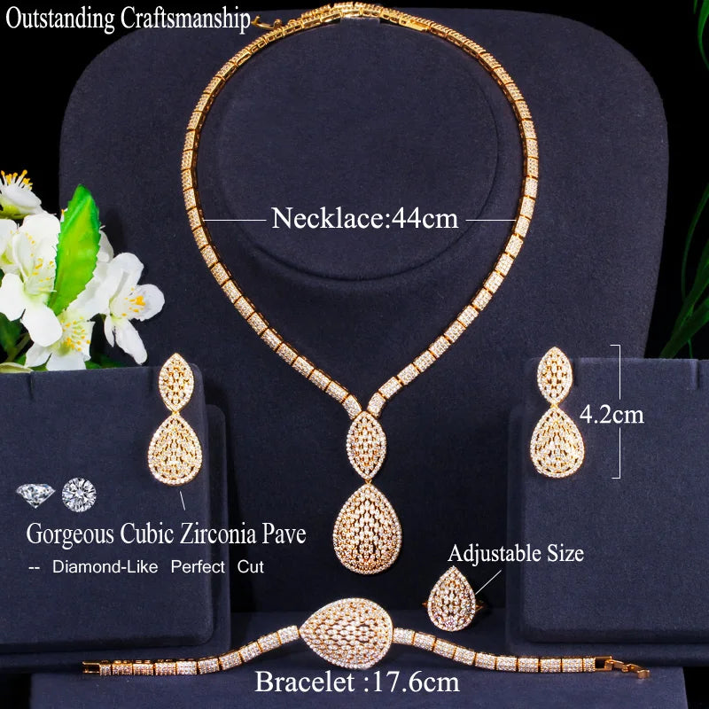 Gold-plated teardrop rhinestone necklace with matching drop earrings and bracelet