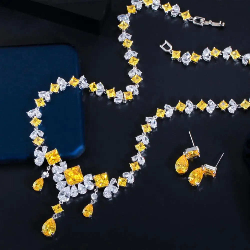 Yellow and clear stone necklace with matching teardrop stud earrings