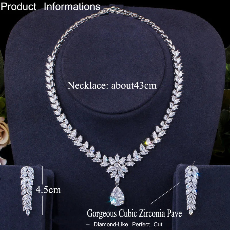 Silver-toned CZ necklace with teardrop pendant and matching marquise drop earrings