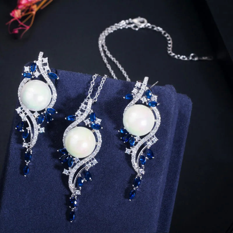 White imitation pearl and blue zirconia necklace with matching leaf drop earrings