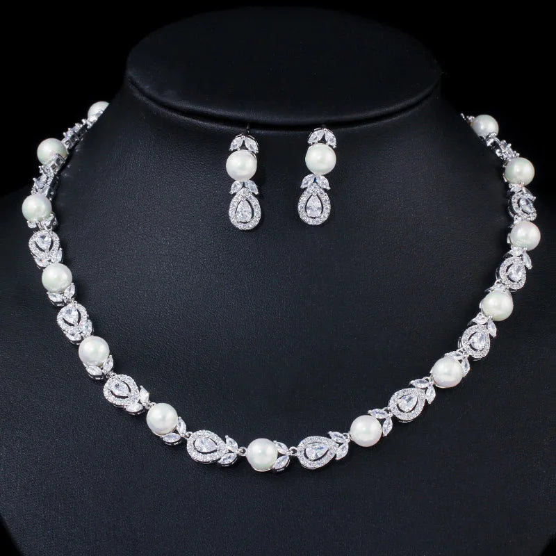 White-tone pearl bead necklace with cubic zirconia oval links and drop earrings set