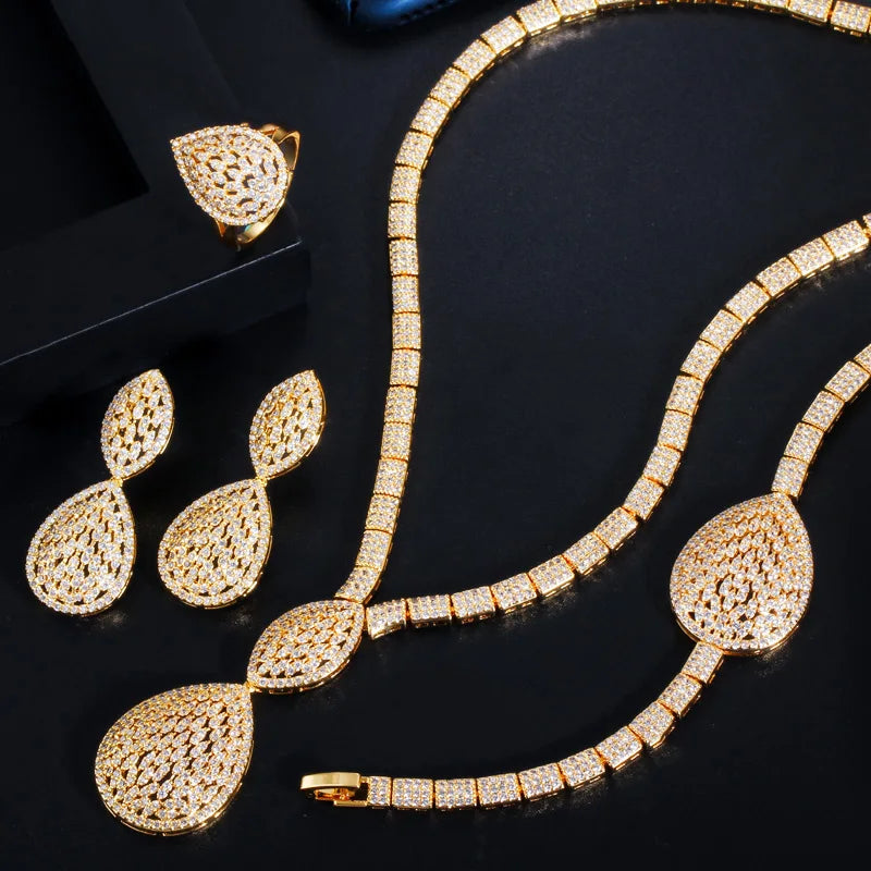 Gold-plated teardrop crystal necklace with drop earrings and slim matching bracelet