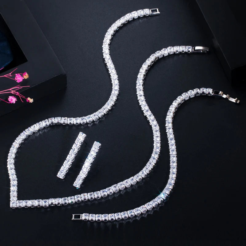 Silver cubic zirconia jewelry set with heart-shaped necklace and stud earrings