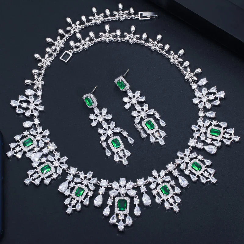 Cubic zirconia necklace with green square accents and matching dangling earrings