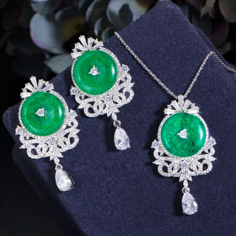Green jade cabochon pendant necklace and drop earrings, silver-tone zircon accents