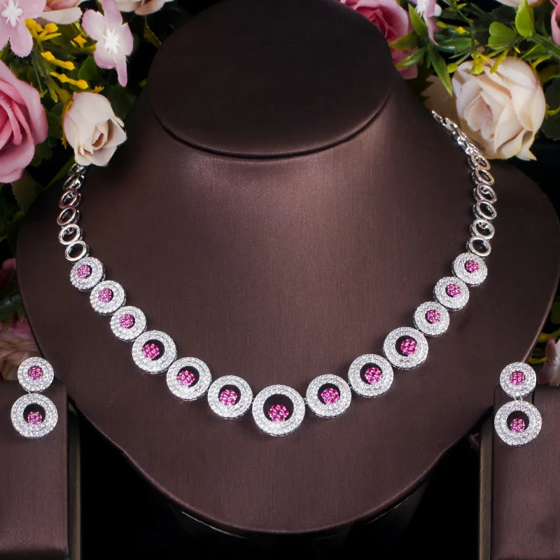 Silver round zirconia necklace and earrings set with pink stones