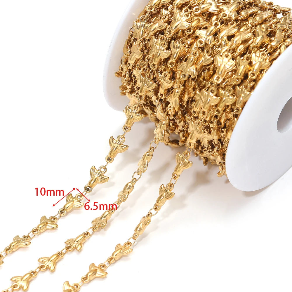 Gold-tone starfish charm chain with oval links, approx 10mm and 6.5mm spacing
