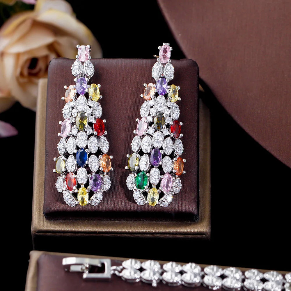 Multicolor cubic zirconia chandelier earrings pair on brown gift box