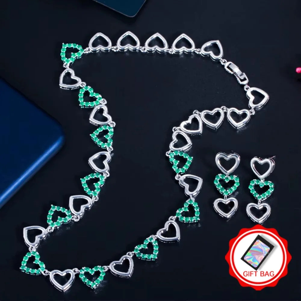 Silver-tone heart necklace and earrings with green stones