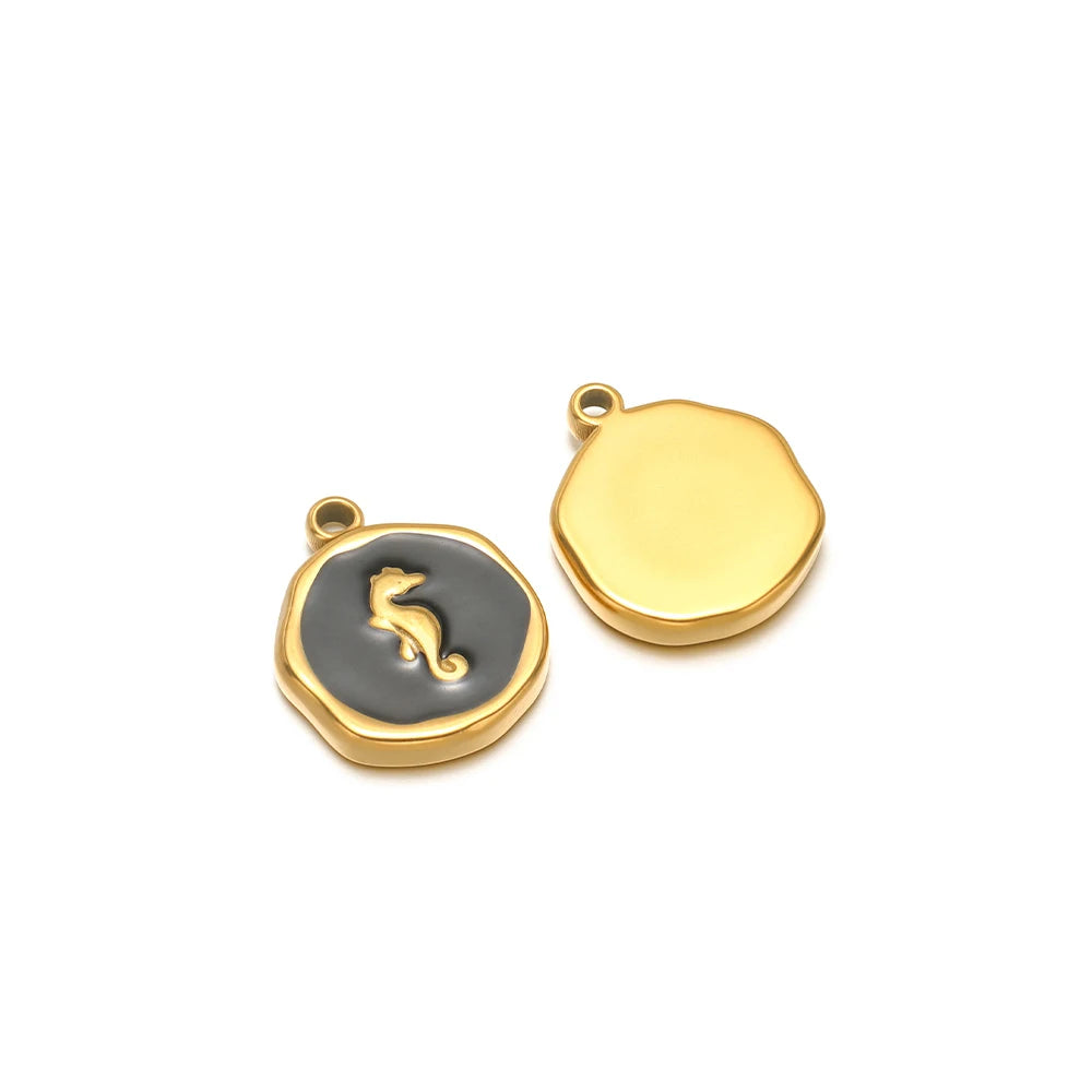 Gold-tone enamel charm pendants: black seahorse motif and plain yellow charm