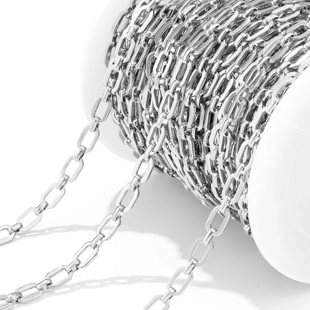 Silver square link chain, close-up view of interlocking metal links for jewelry making