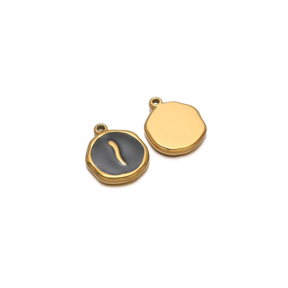 Round enamel charm pendant with gold border, dark gray snake design and plain gold charm