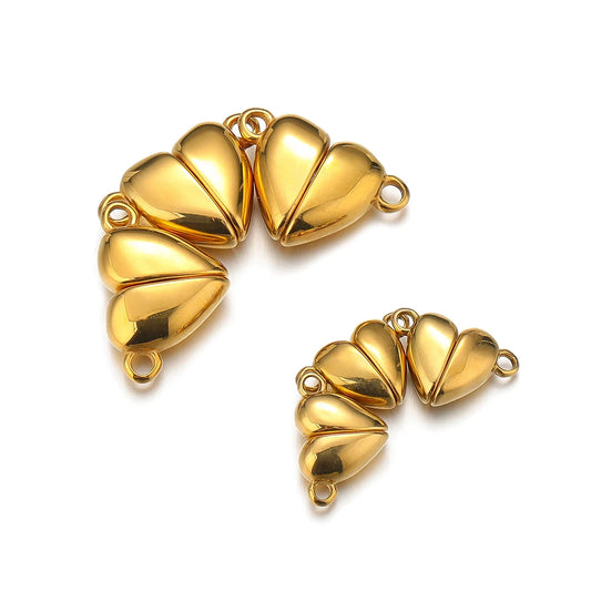 Gold heart-shaped magnetic clasp connector with loop rings for DIY jewelry making.