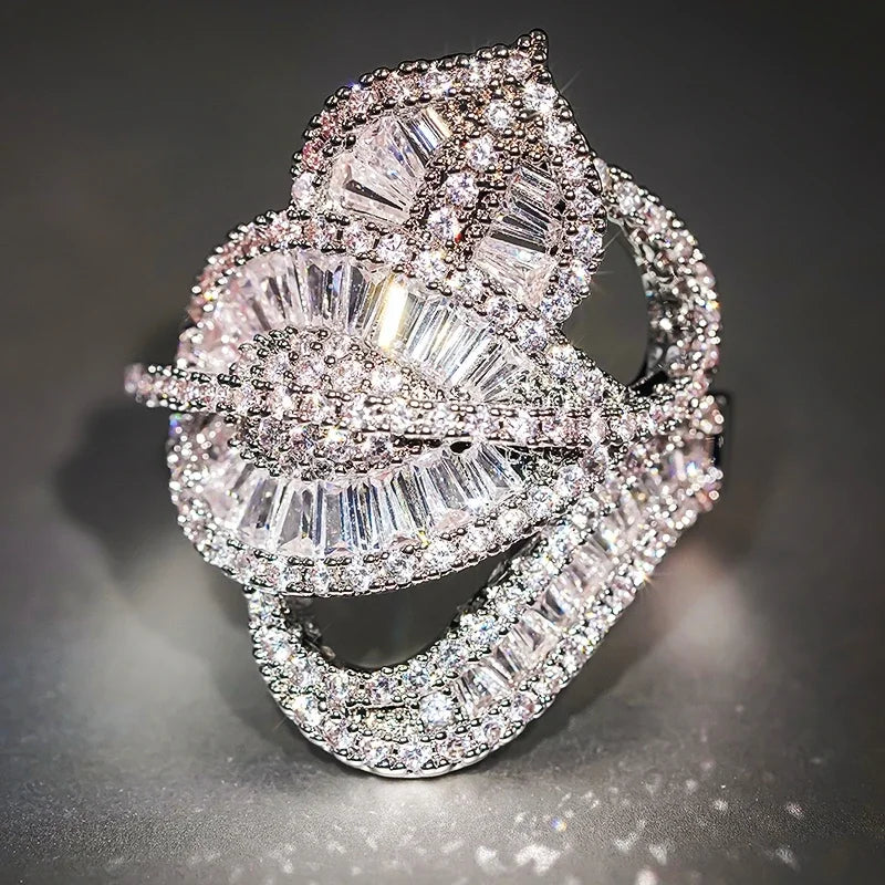 Women's leaf ring with layered pavé and baguette clear stones