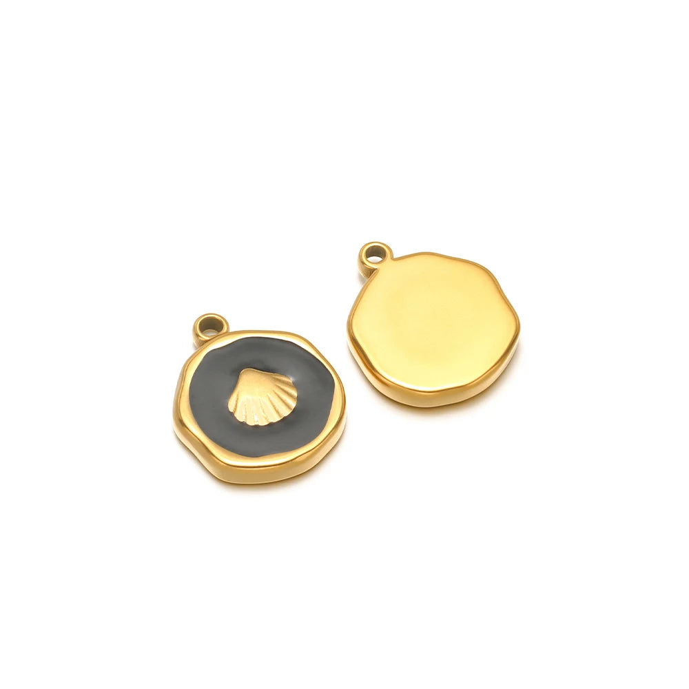Enamel shell charm pendants, one black with gold shell design and one yellow plain cap