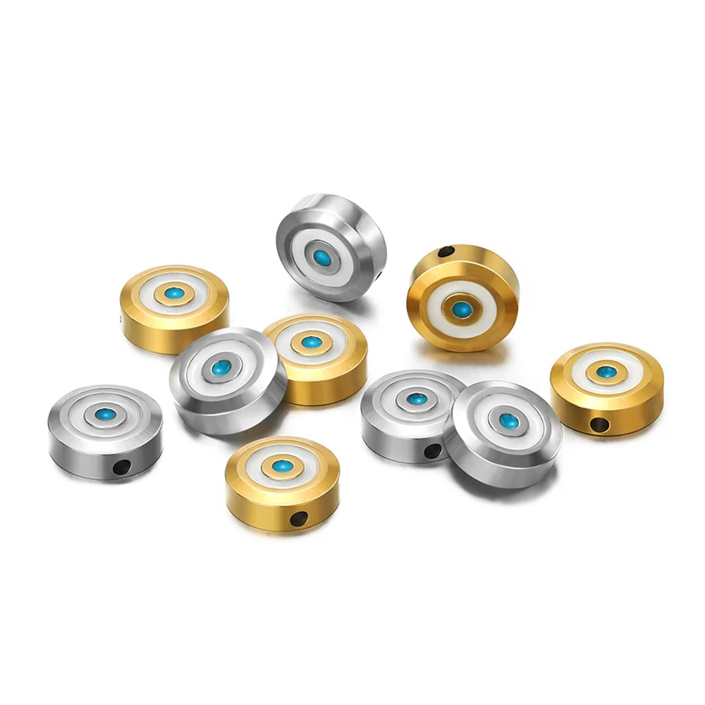 Round evil-eye enamel beads, gold and silver tones with blue center inserts