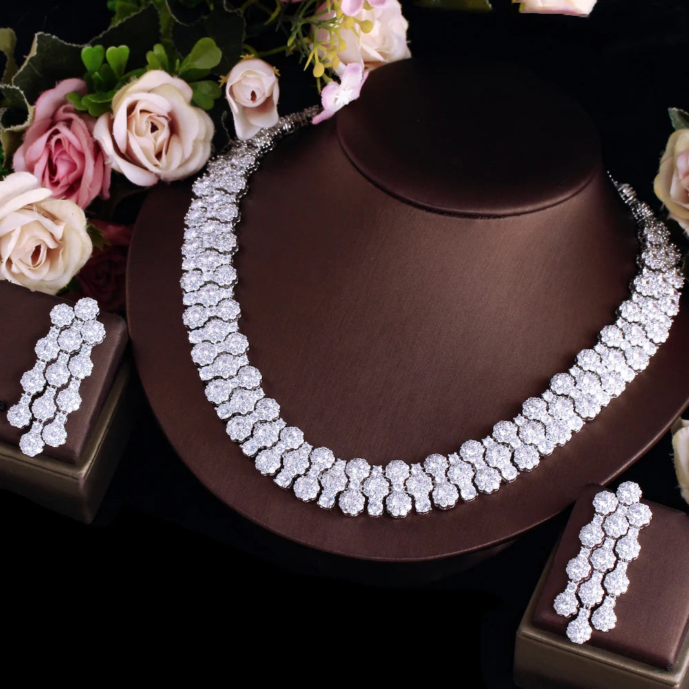 Silver-tone cubic zirconia necklace and matching earrings shown as a jewelry set