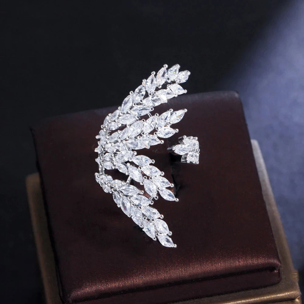 Silver-tone open ring with curved rows of clear marquise-cut stones