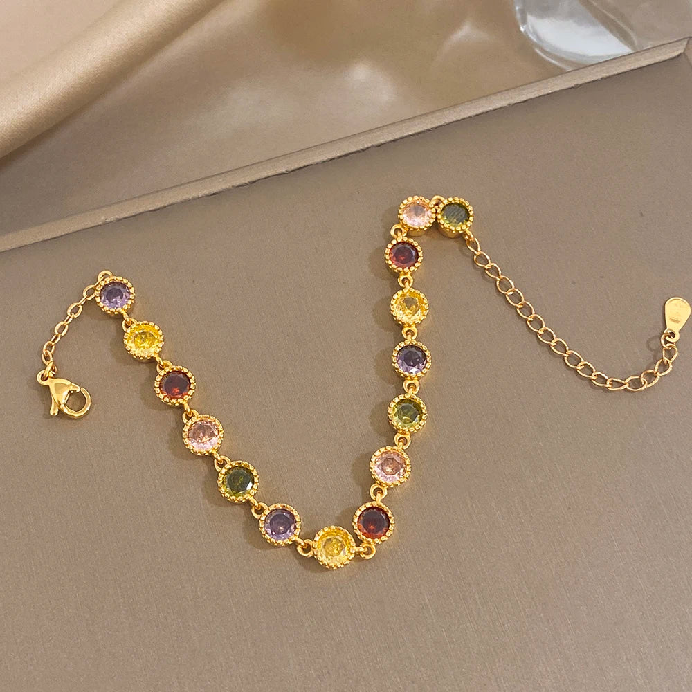 Gold-plated zirconia tennis bracelet set with multicolor round stones on chain