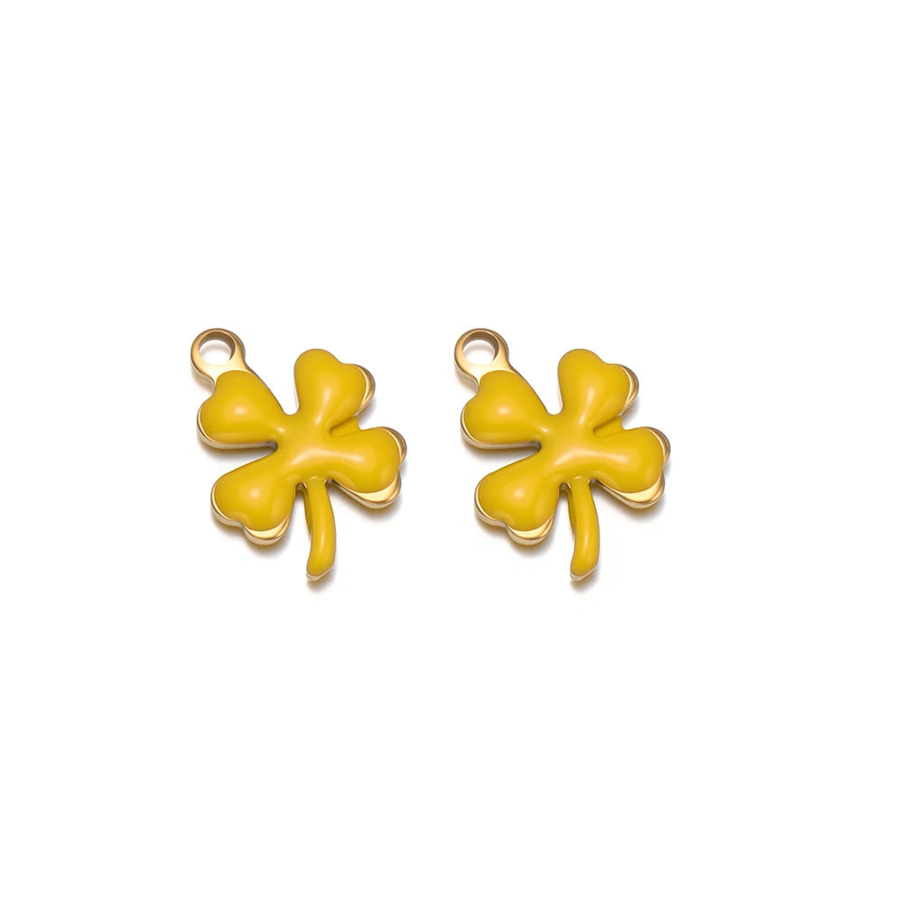 Yellow enamel clover flower charms with gold-tone loops, pair view