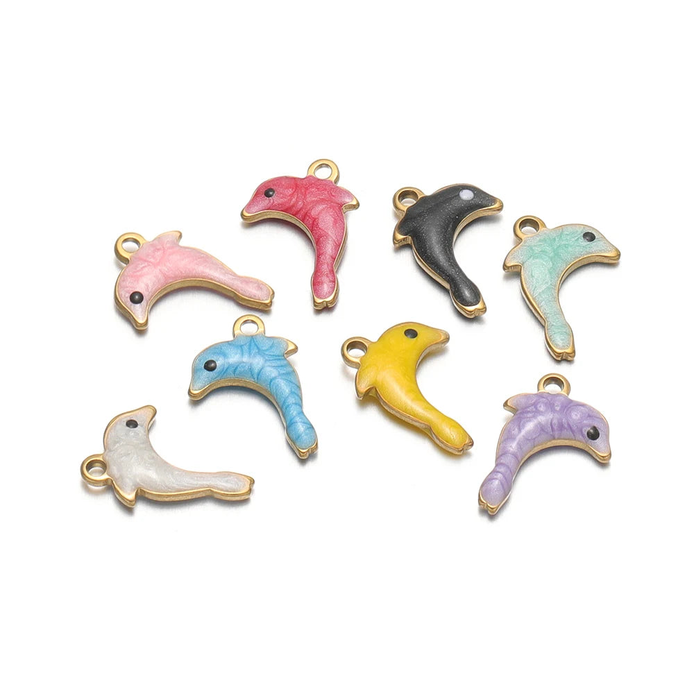 Assorted enamel dolphin charms in pink, black, yellow, blue, lavender, and white