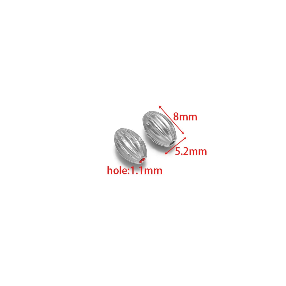 Silver striped pumpkin spacer beads with 1.1mm hole, ribbed barrel shape