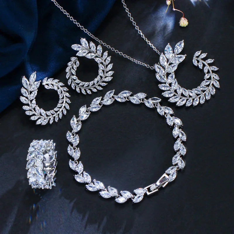 Leaf CZ jewelry set: silver-tone hoop earrings, bracelet, and ring with clear stones