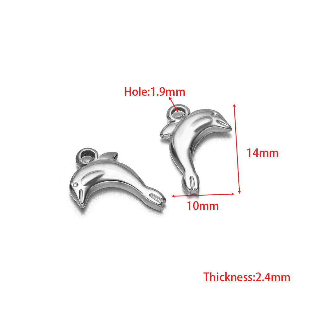 Silver dolphin-shaped pendant charms with loop bail