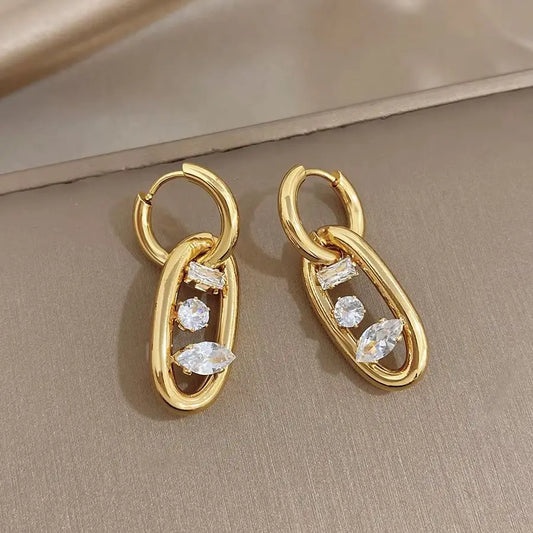 Gold-plated hoop earrings with oval zircon drops