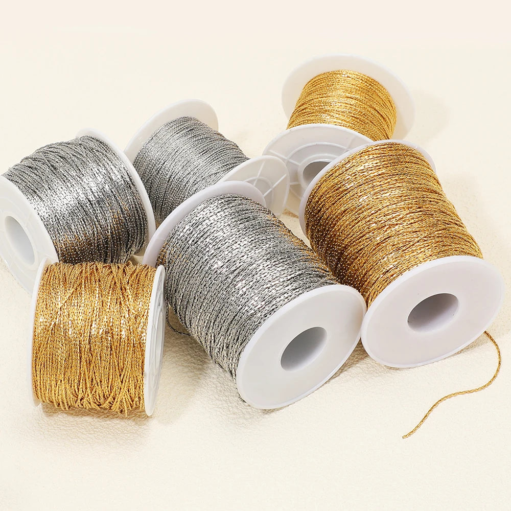 Gold and silver thin wire chains on white spools, DIY jewelry supplies