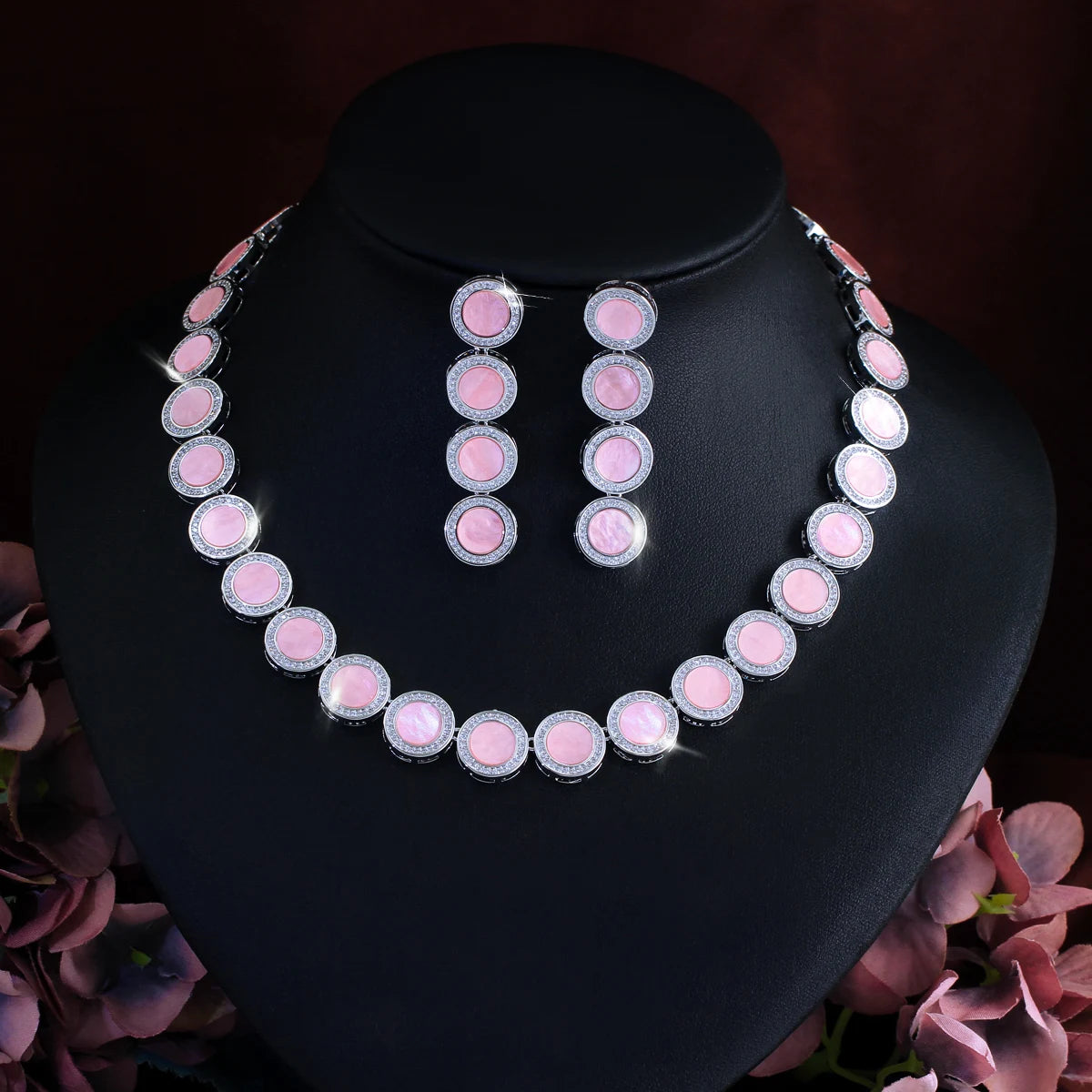 Pink oval link necklace and matching drop earrings, silver-tone bezel settings