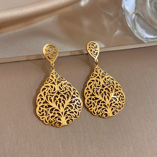Gold filigree hollow teardrop flower dangle earrings with heart-top hooks