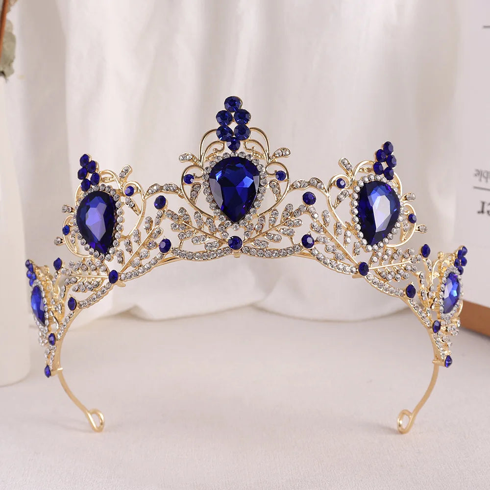 Gold bridal tiara with dark blue rhinestone crown and deep blue faceted stones