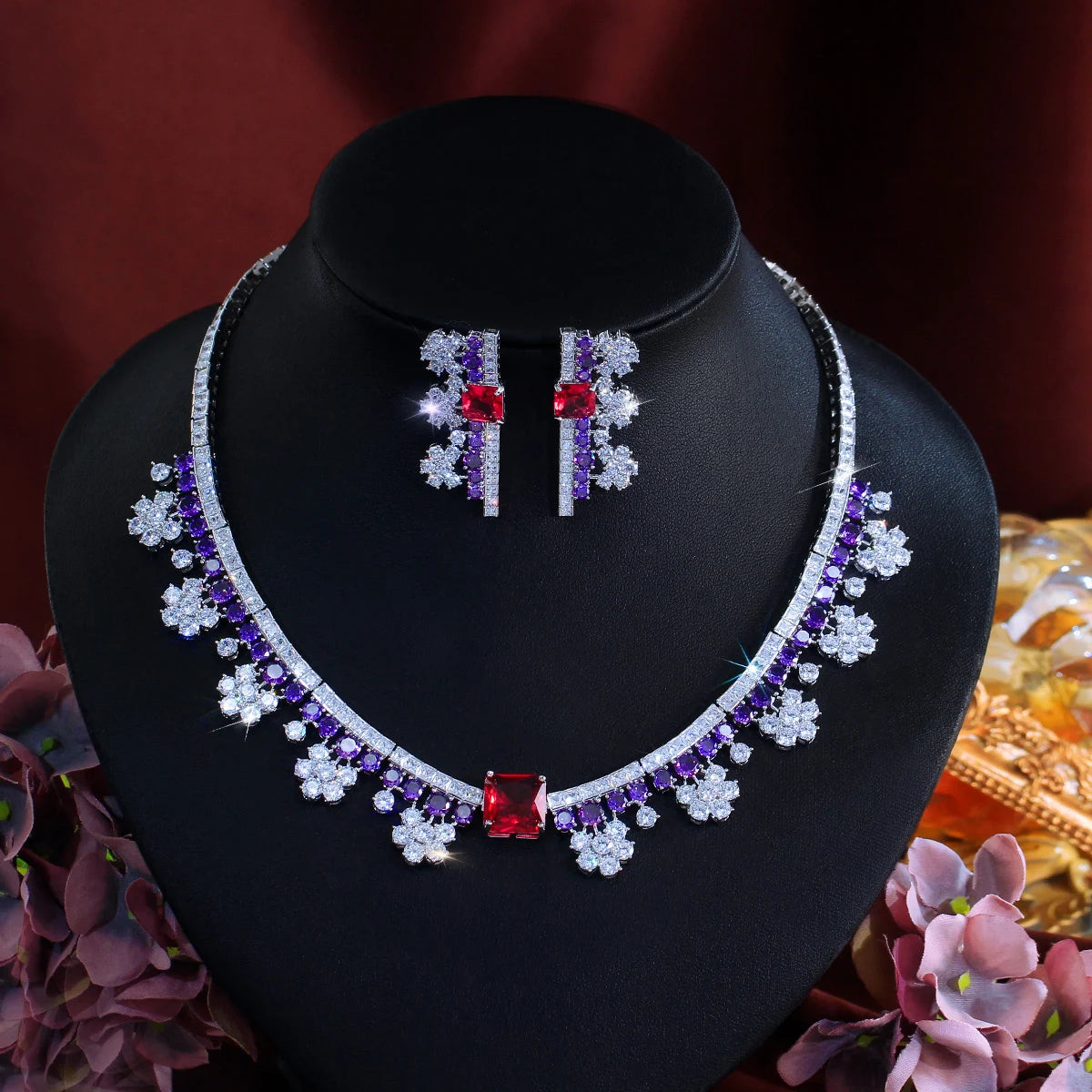 Multicolor crystal choker necklace with red and purple stones; dangling bar earrings