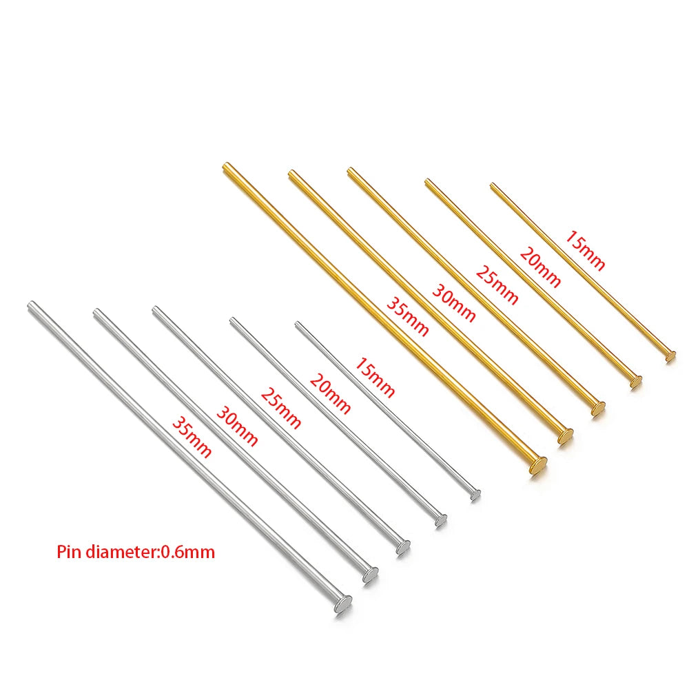 Assorted T-head flat pins, gold and steel, 15–35 mm lengths, 0.6 mm pin